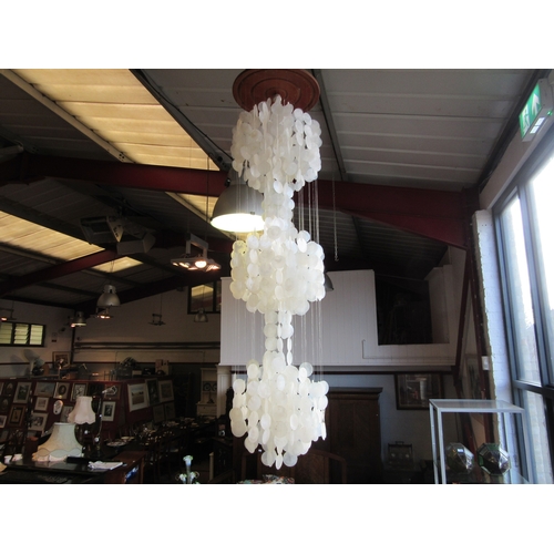 1432 - A Scandinavian influence ceiling light with shell hanging discs