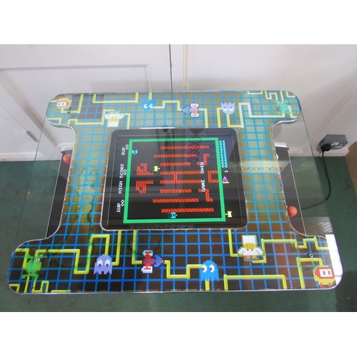 5006 - A Multi-Game two player cocktail arcade machine programmed with 60 games. 73.5cm long x 56cm wide x ... 