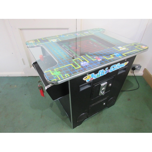 5006 - A Multi-Game two player cocktail arcade machine programmed with 60 games. 73.5cm long x 56cm wide x ... 