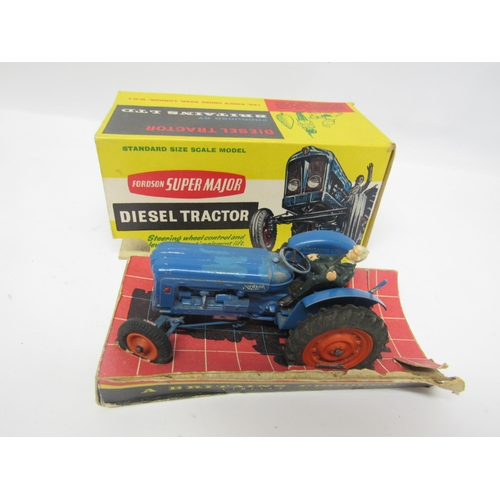 5118 - Two boxed Britains farm issue diecast Fordson Super Major Diesel Tractors, together with another unb... 