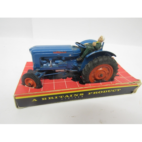 5118 - Two boxed Britains farm issue diecast Fordson Super Major Diesel Tractors, together with another unb... 