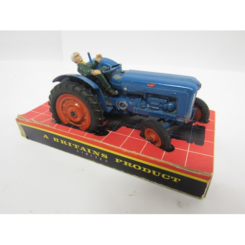 5118 - Two boxed Britains farm issue diecast Fordson Super Major Diesel Tractors, together with another unb... 