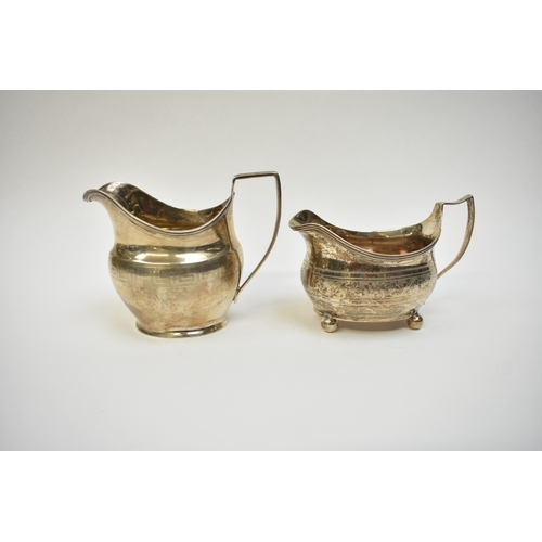 8080 - Two Georgian silver cream jugs including Thomas Wallis II 1806 with monogram to central cartouche. T... 