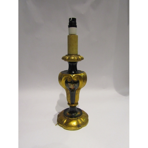 4088 - A painted Italian table lamp with carved and gilt decoration, having floral relief