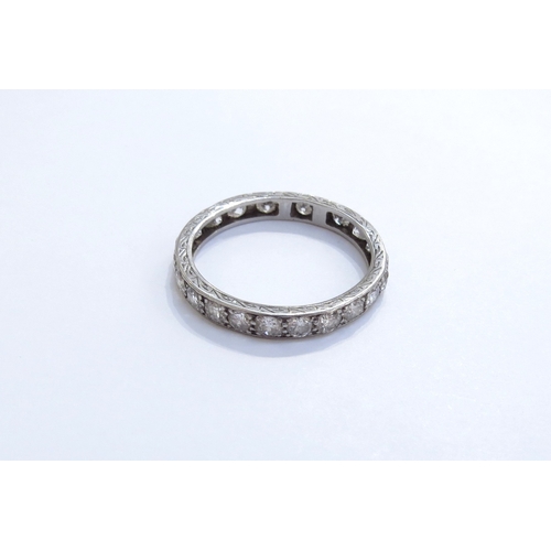 6283 - A diamond eternity ring, unmarked (has been resized). Size S, 3.1g