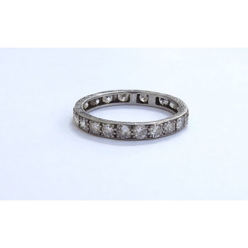 6283 - A diamond eternity ring, unmarked (has been resized). Size S, 3.1g