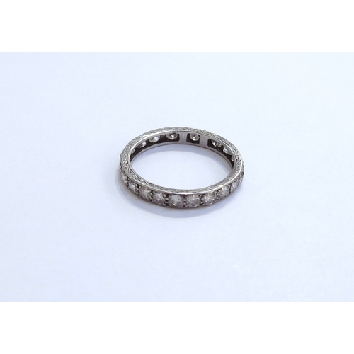 6283 - A diamond eternity ring, unmarked (has been resized). Size S, 3.1g