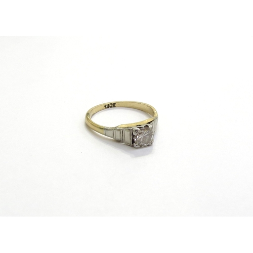 6272 - A diamond solitaire ring 0.25ct approx round diamond in square setting with stepped shoulders, stamp... 