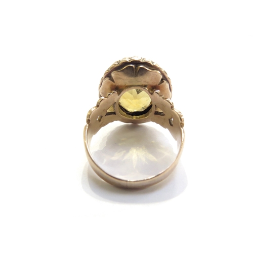 6014 - A Victorian citrine and seed pearl ring with open heart scroll shoulders, unmarked. Size N/O, 7g