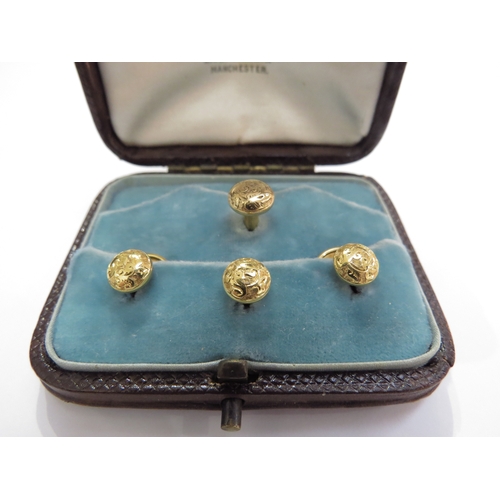 6314 - A set of four 18ct gold gentleman's shirt studs, cased, 4.8g