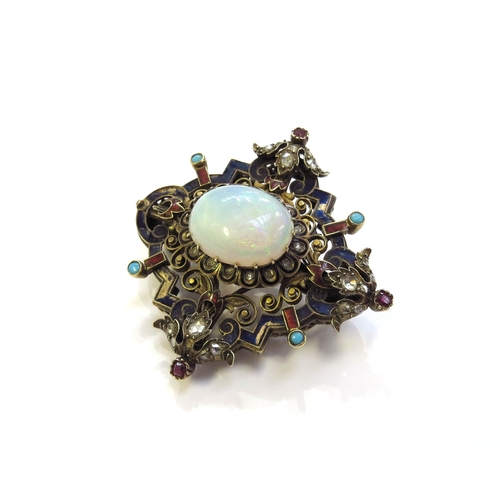 6340 - An ornate enamelled brooch studded with old cut diamonds, cabochon turquoise and rubies, the centre ... 