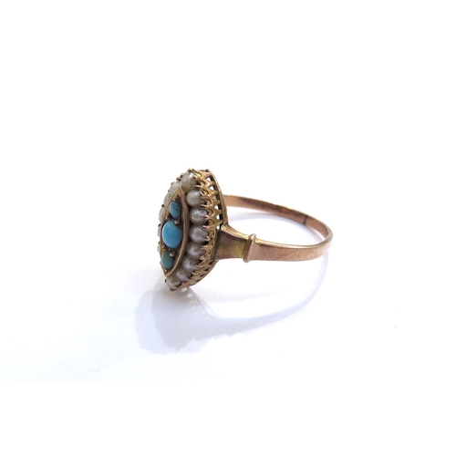 6291 - A gold marquise shaped ring set with three cabochon turquoise and seed pearls, stamped 9ct. Size L, ... 