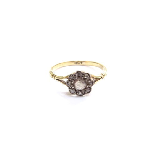 6307 - An old cut diamond cluster ring, stamped 18ct. Size M/N, 2.1g