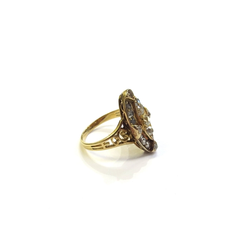 6393 - A marquise shaped old cut diamond cluster ring, unmarked gold. Size M, 5.4g