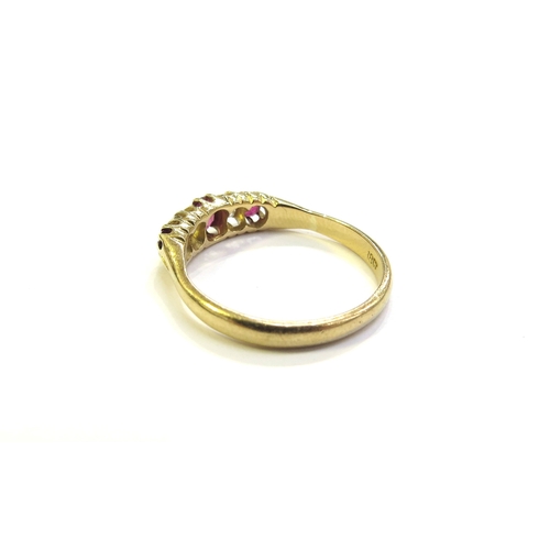 6317 - A five stone ruby and diamond ring, stamped 18ct. Size Q/R, 3.3g