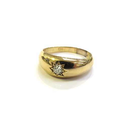 6278 - An 18ct gold ring set with a single diamond in star setting, marks rubbed (signs of re-sizing). Size... 