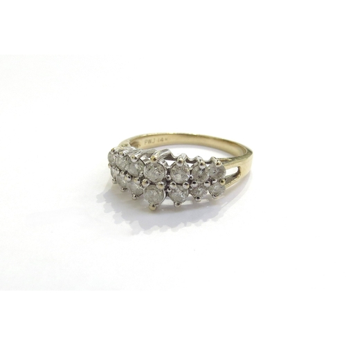 6280 - A two row diamond ring, stamped 14k. Size R, 3.8g