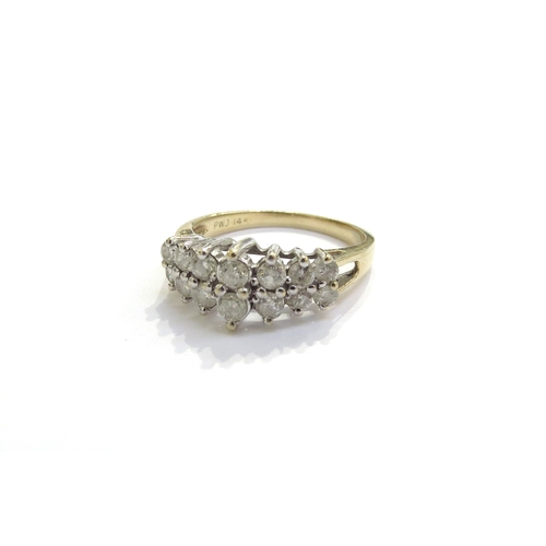 6280 - A two row diamond ring, stamped 14k. Size R, 3.8g