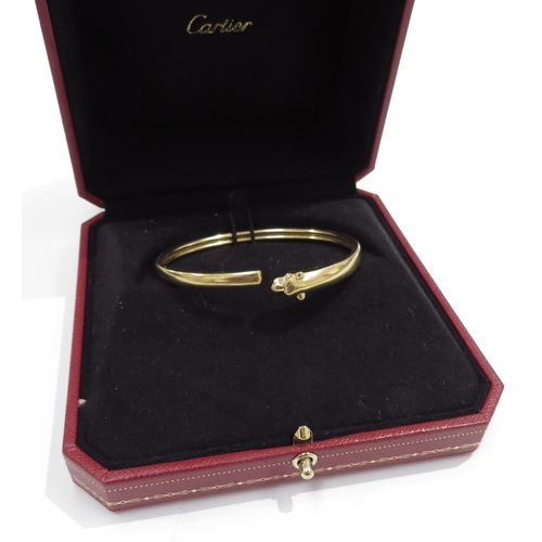 6074 - CARTIER; Panthère de Cartier bracelet, 18ct yellow gold the panther having an onyx nose and set with... 