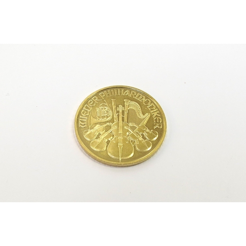 6194 - A gold 2009 Wiener Philharmoniker, Republik Osterreich 50 euro coin, 1/2 unce gold 999.9