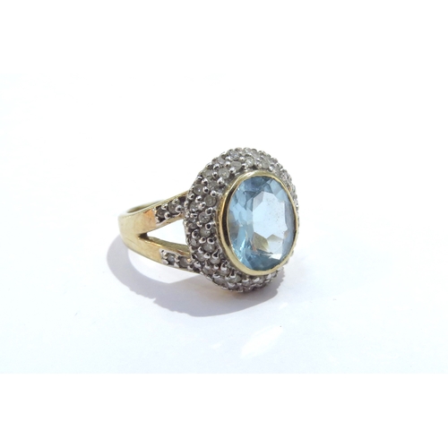 6024 - A 9ct gold topaz and diamond cluster ring. Size M, 4.4g