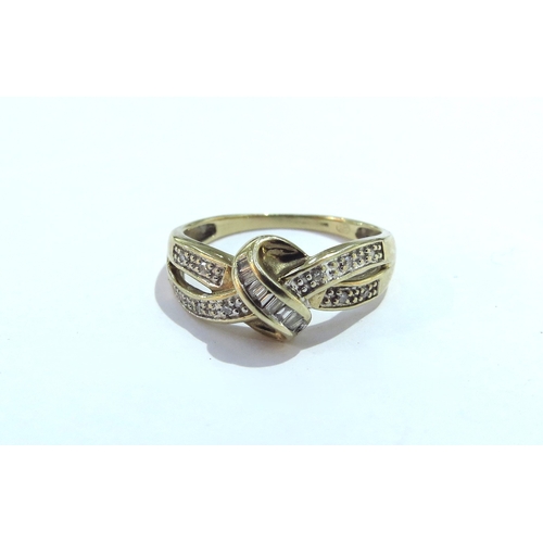 6073 - A 9ct gold ring, the centre Knot with baguette cut diamonds with round cut diamonds set to shoulders... 