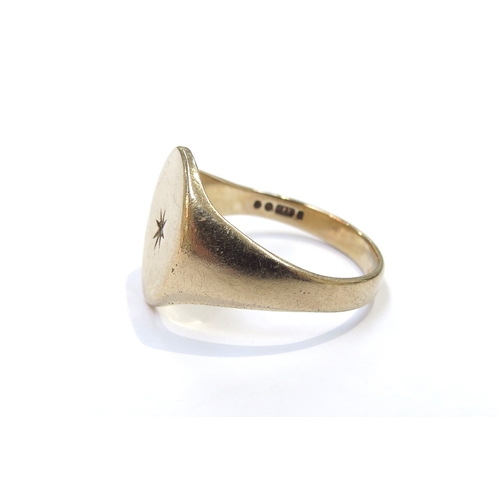 6140 - A 9ct gold signet ring set centrally with a small diamond in star setting. Size Y, 6.3g