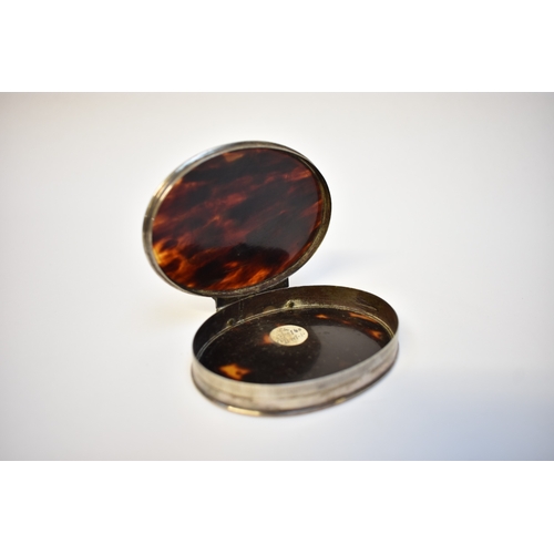 8020 - An early to mid 18th Century oval tortoiseshell and silver snuff box with stand away hinge. The top ... 