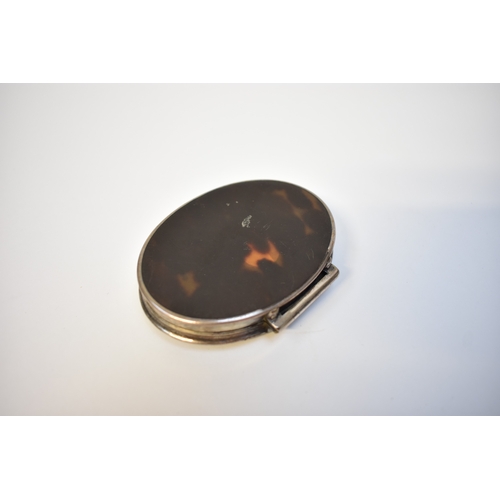 8020 - An early to mid 18th Century oval tortoiseshell and silver snuff box with stand away hinge. The top ... 