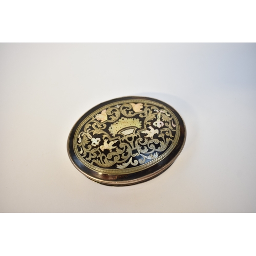 8019 - A late 17th/early 18th Century tortoiseshell and silver oval lidded snuff box, the top decorated wit... 