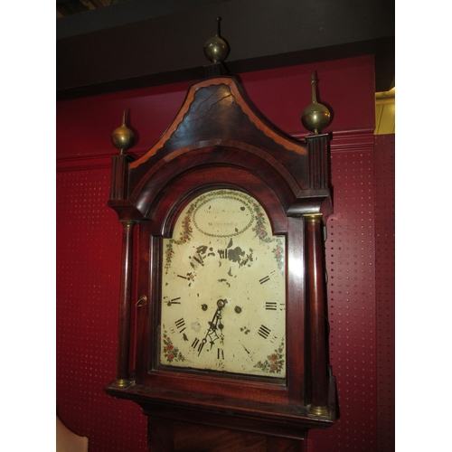 4039 - A Georgian mahogany grandfather clock with worn arch top dial, Woodbridge maker with weights and pen... 