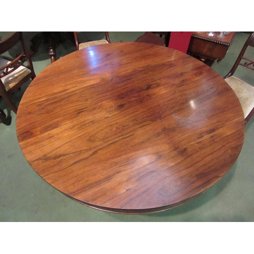 4052 - A Regency rosewood breakfast table on single pedestal base, acanthus scrolled leaf feet, split to to... 