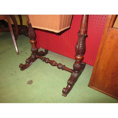 4057 - Circa 1840, a flame mahogany sewing table the internal mirror rising lid with key and fitted interio... 