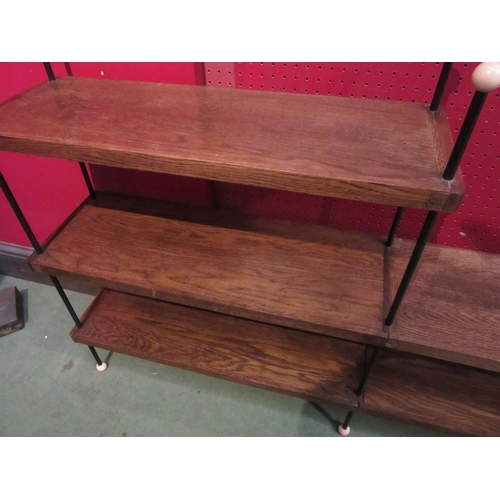 4068 - A 1960's Sputnik oak three tier floor shelf, 78cm tall x 125cm long x 23cm wide