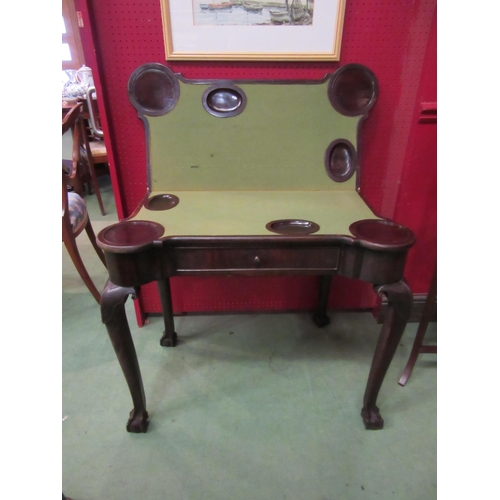 4082 - An early 20th Georgian style Irish games table with fold over green baize top and counter holders on... 