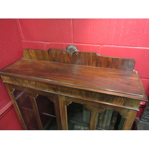 4091 - A 1930's figured walnut display cabinet on cabriole legs, 138cm tall x 90cm wide x 30cm deep