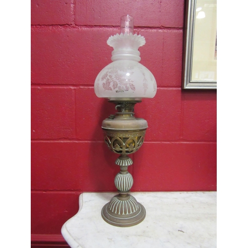 4114 - A Victorian brass oil lamp with etched glass