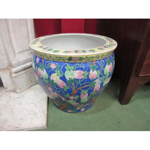 4120 - An Oriental planter decorated with butterflies and exotic plants, 36cm diameter 31cm height