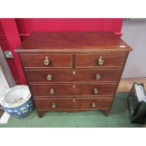 4123 - A George III mahogany straight front chest of two short over three long drawers, with repousse brass... 