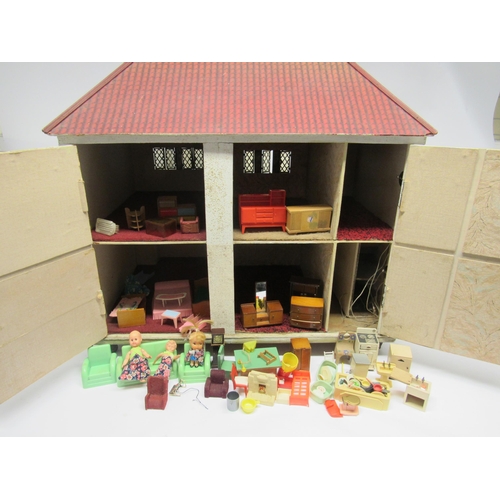 5042 - A mid 20th Century rear opening two-storey dolls house in the manner of Triang, with tinplate chiney... 