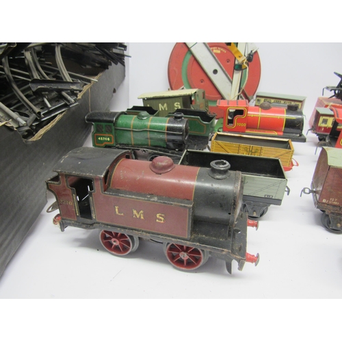 5134 - A collection of playworn 0 gauge model railway rolling stock and accessories including Hornby LMS 0-... 