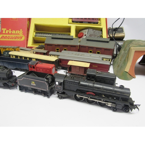 5137 - A collection of playworn Triang 00 gauge locomotives, rolling stock and accessories including R2 Pas... 