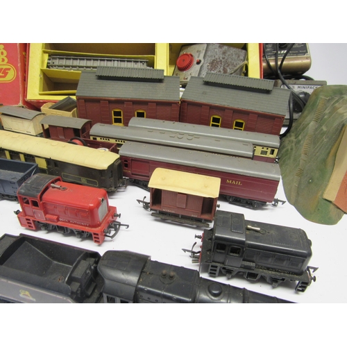 5137 - A collection of playworn Triang 00 gauge locomotives, rolling stock and accessories including R2 Pas... 