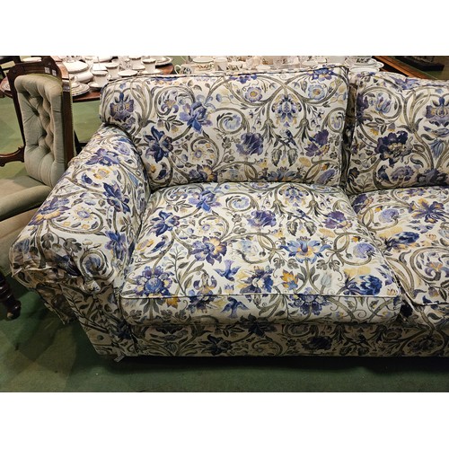 4125 - A Multiyork large two seater sofa with blue floral design including feather cushions. Approx. 87cm h... 