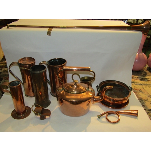 4206 - A selection of copperware to include kettle, cylindrical tankards, coaching horn, bugle etc.