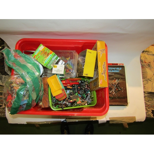 4232 - A box of mainly toy soldiers including related books