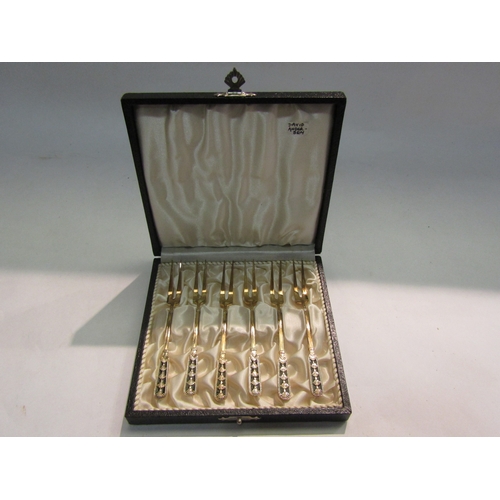 4239 - A cased set of six David Anderson, Norway, pickle forks marked Sterling