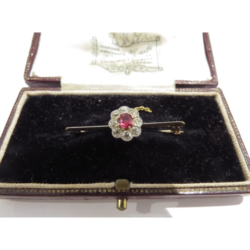 6026 - A ruby and diamond cluster bar brooch, 3.5cm long, 2.3g, in fitted box