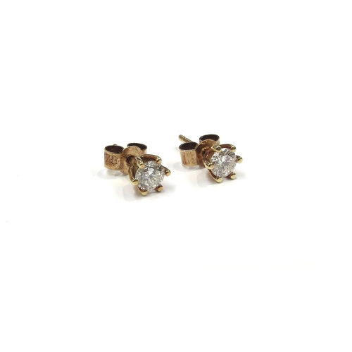 6295 - A pair of diamond stud earrings, 0.20ct each approx