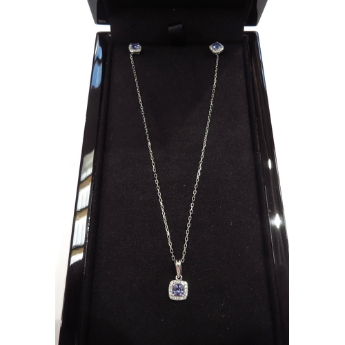 6296 - A 9ct white gold chain 46cm long hung with a tanzanite and diamond cluster pendant with a pair of ma... 